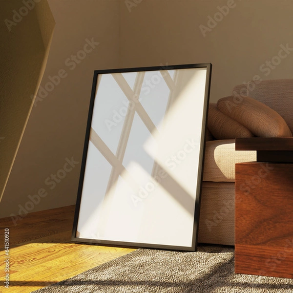 Obraz cinematic frame mockup poster template leaning on the sofa lit by sunlight with reflection effect in the living room