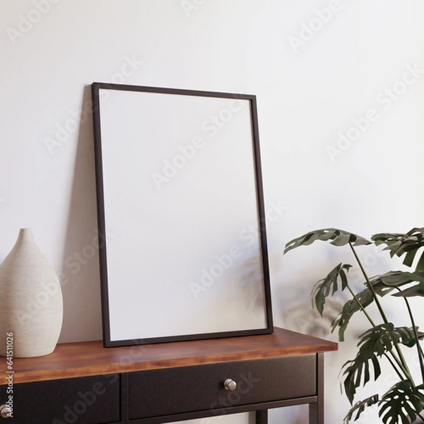 Obraz minimalist aesthetic frame mockup poster template on the table leaning on the white wall from side angle