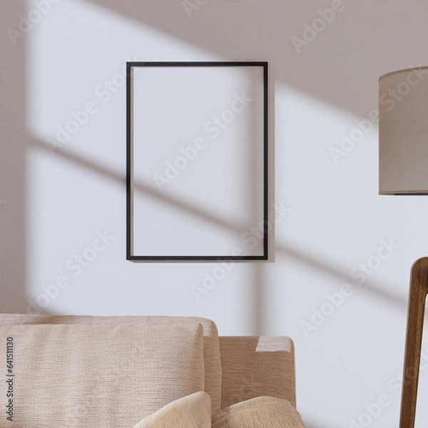 Obraz simple minimalist frame mockup poster template hanging on the white wall with sofa and standing lamp