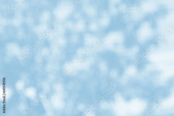 Fototapeta Light blue blurred bokeh abstract for background.