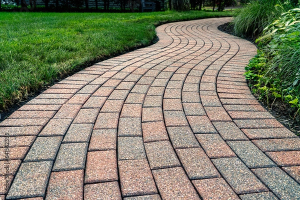 Obraz Brick pavers arranged in a curving pattern.