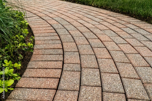 Obraz Brick pavers arranged in a curving pattern.