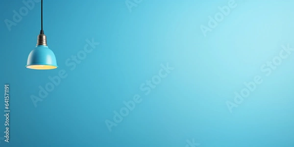 Obraz light bulb on blue background