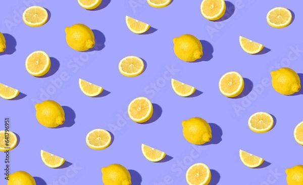 Obraz Colorful pattern of fresh ripe whole and sliced lemons