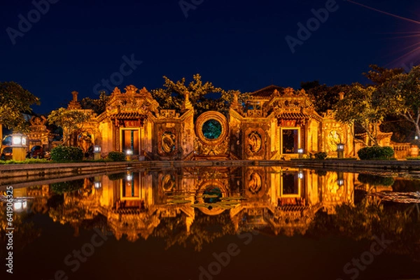 Fototapeta Night View on the temple in old town of Hoi An, Vietnam. Unesco World Heritage Site. The Bu Mu temple gate Cong Chua Ba Mu, ancient temple at Hoi An ancient town.