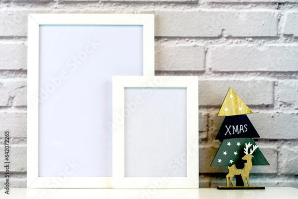 Obraz Christmas Frame. Photo frame. Flat lay. New Year concept. Christmas mock up. Winter. Christmas background. Xmas concept. Top view, copy space. Christmas photo frame mock up template