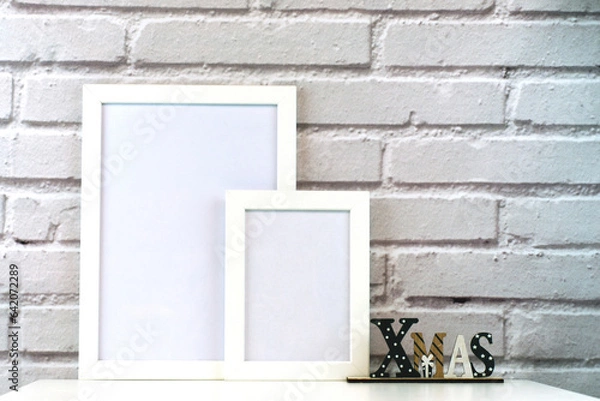 Obraz Christmas Frame. Photo frame. Flat lay. New Year concept. Christmas mock up. Winter. Christmas background. Xmas concept. Top view, copy space. Christmas photo frame mock up template