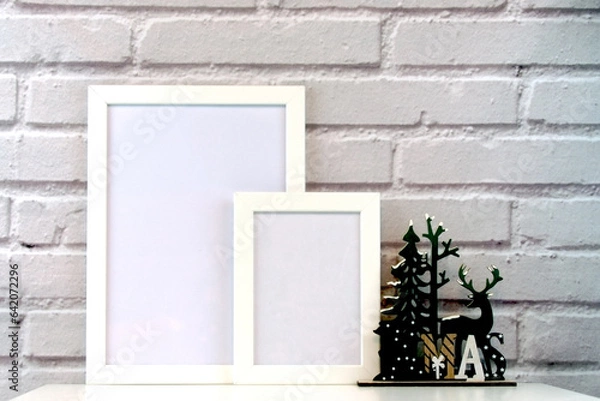 Obraz Christmas Frame. Photo frame. Flat lay. New Year concept. Christmas mock up. Winter. Christmas background. Xmas concept. Top view, copy space. Christmas photo frame mock up template