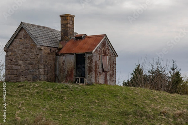 Obraz Old shepherds hut up on a hill
