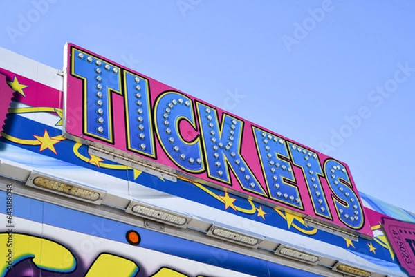 Fototapeta Amusement park carnival ride entrance ticket booth sign