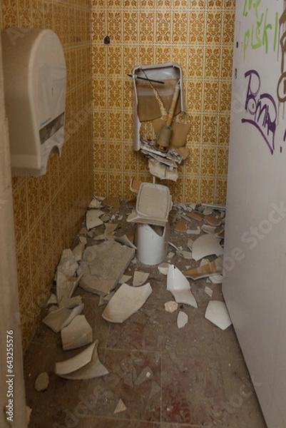 Fototapeta view of a completely broken ceramic toilet