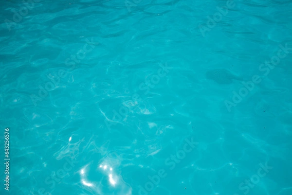 Obraz Pool water, cool blue, filling the entire frame. High resolution background or texture asset.