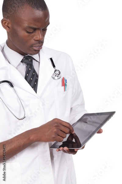 Obraz Young black doctor looking at tablet