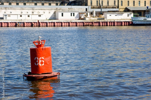 Fototapeta Red river buoy floating