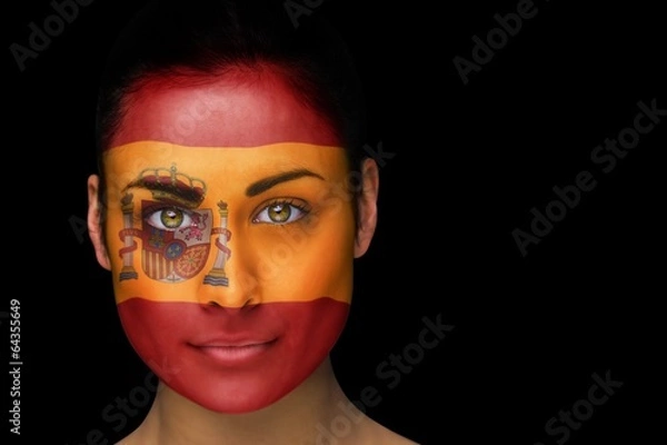Fototapeta Composite image of spanish football fan in face paint