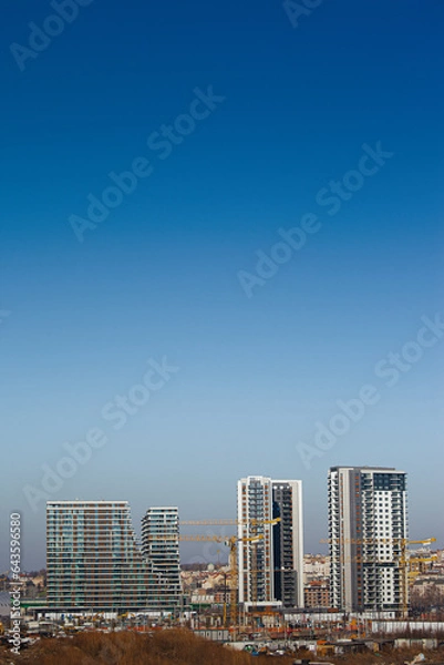 Fototapeta Big construction site with cranes