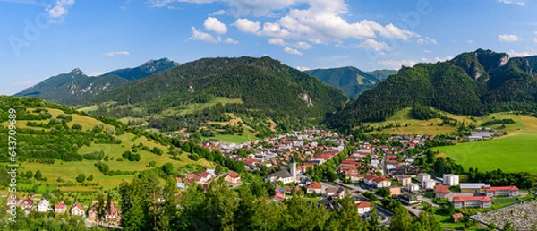 Fototapeta Terchova, mountain panorama of Mala Fatra National Park with a small village in the valley. View from the Terchovske srdce lookout tower, a tourist attraction on the hiking trail.