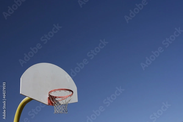 Fototapeta Basketball Backboard and Net on Bright Blue Sky