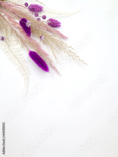 Fototapeta Flatley of pink flowers on a white background. Welcome card, decor. Top view, space for text. High quality photo