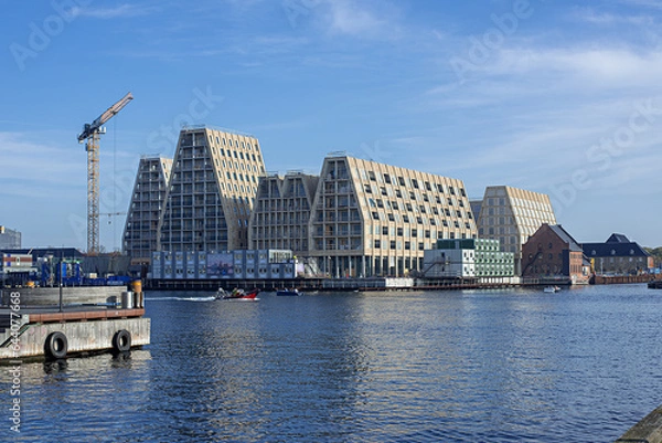 Fototapeta modern scandinavian residential architecture is being constructed on the paper island