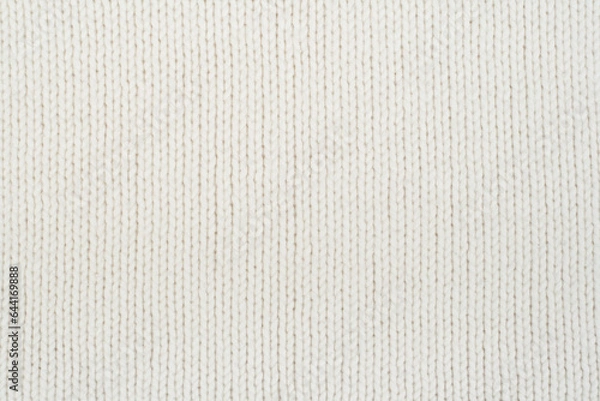 Obraz Sweater or scarf fabric texture large knitting. Knitted jersey background with a relief pattern. Wool hand- machine, handmade.