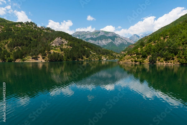 Fototapeta Beautiful scenery from the shores of Komani Lake as seen from the ferry from Fierza to Koman, Albania