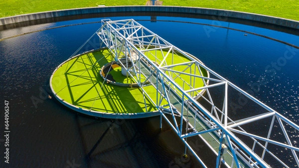 Fototapeta Sewage treatment plant from above. Grey water recycling. Waste management theme. Ecology and environment in European Union.	