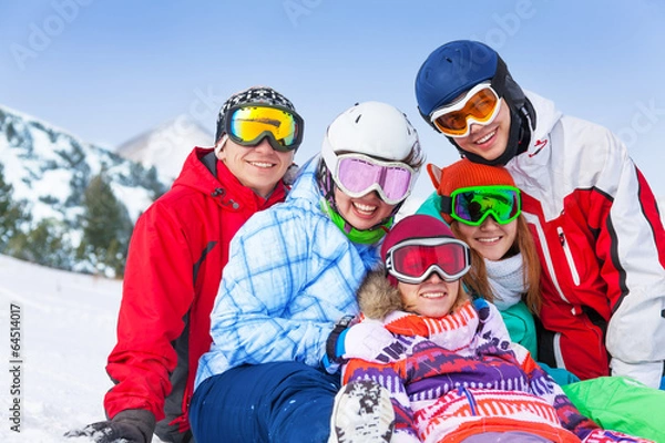 Fototapeta Five happy smiling friends with snowboards