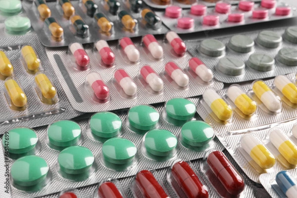Obraz Many blisters with different pills as background, closeup