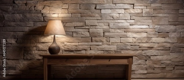 Fototapeta Contemporary lighting fixtures illuminate the spacious and bare features of the stone surface within the interior layout.