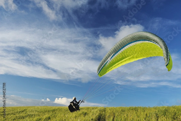 Fototapeta Paraplending at sunset