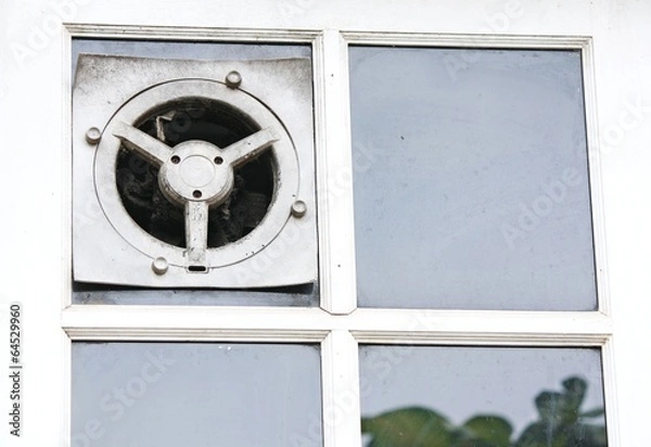 Fototapeta Exhaust fan in the kitchen is embedded in the glass wall