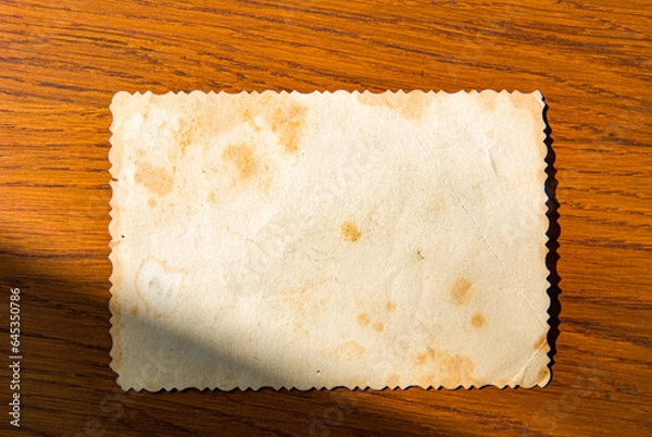 Obraz old paper on wooden background