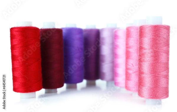 Obraz Colored spools of threads isolated on white
