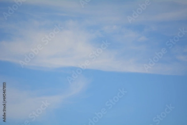 Obraz Blue sky background with white clouds