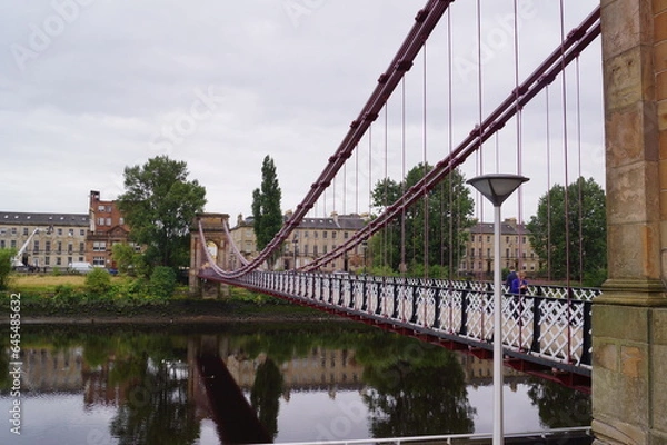 Fototapeta Close up view of South Portland Street suspension bridge in Glasgow, Scotland (UK)