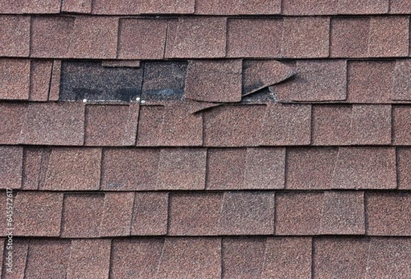 Fototapeta Two Shingles Missing from Mansard Roof