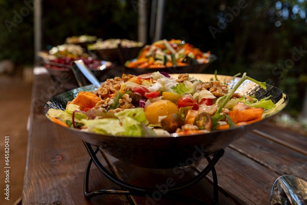 Obraz salad on a plate and several salads around