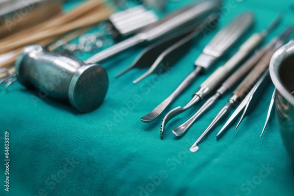 Obraz Soft focus Surgical tools and equipment on green cloth. Sterilized
