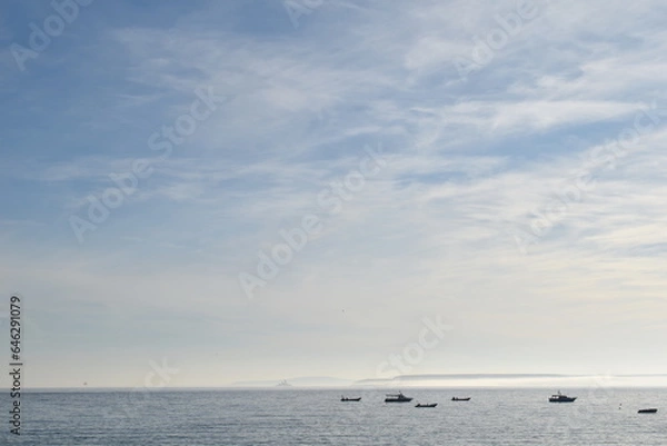 Fototapeta clouds over the sea