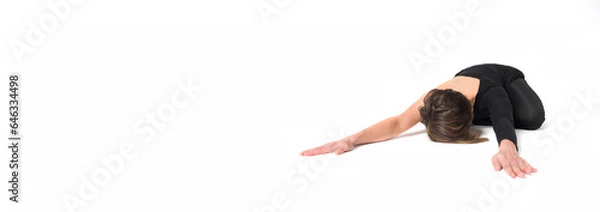 Obraz Woman practices yoga on a white background