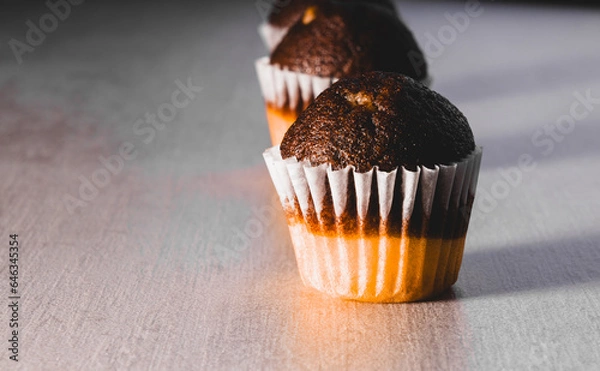 Obraz line of chocolate cupcakes 