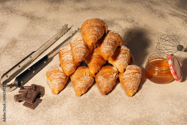 Obraz croissant pyramid with honey and chocolate