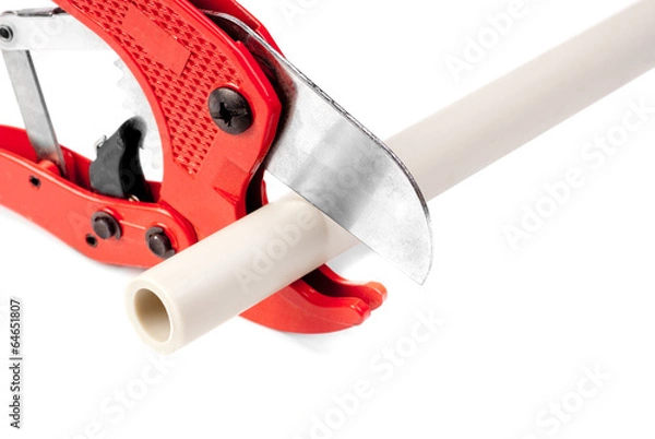 Fototapeta Tools for cutting pvc pipe isolated on white background