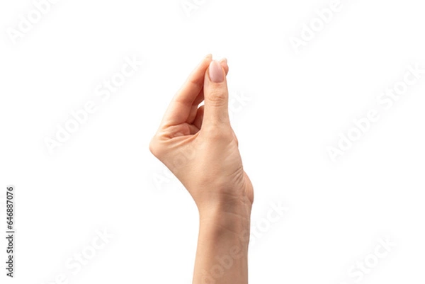 Fototapeta Hand of a woman holds some tiny or thin object.