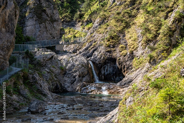 Obraz View over the small Stuiben Falls on a sunny day, reutte, Austria. Small waterfalls in beautiful nature.