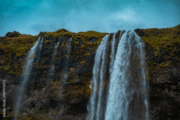 Obraz Kvernufoss a 30-meters high waterfall accessible via a rugged hiking trail in Iceland