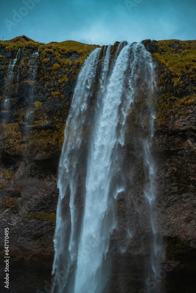Obraz Kvernufoss a 30-meters high waterfall accessible via a rugged hiking trail in Iceland