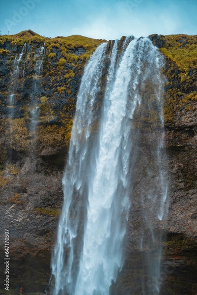 Obraz Kvernufoss a 30-meters high waterfall accessible via a rugged hiking trail in Iceland