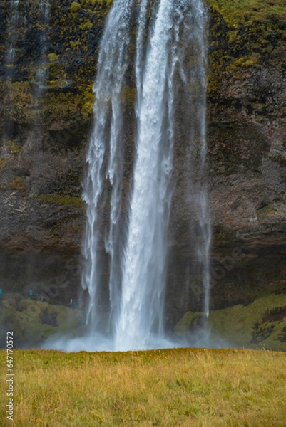 Obraz Kvernufoss a 30-meters high waterfall accessible via a rugged hiking trail in Iceland